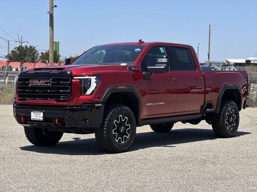 Volcanic Red Tintcoat 2026 GMC Sierra 2500 AT4X