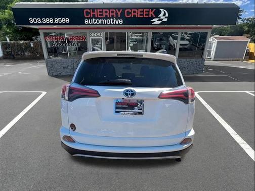 Super White 2018 Toyota RAV4 Hybrid LE