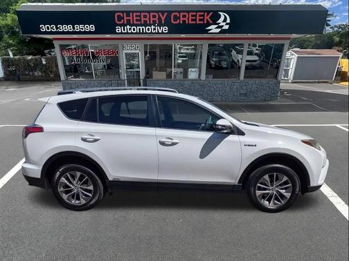 Super White 2018 Toyota RAV4 Hybrid LE