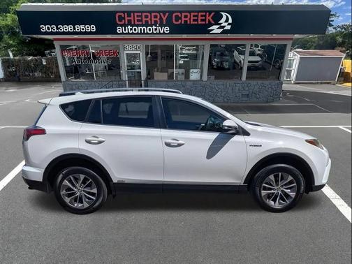 Super White 2018 Toyota RAV4 Hybrid LE