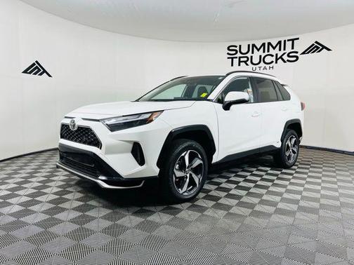 Wind Chill Pearl/Midnight Black Metallic 2025 Toyota RAV4 Hybrid SE