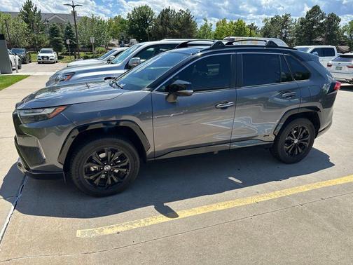 Silver Sky Metallic/Midnight Black Metallic 2023 Toyota RAV4 Hybrid SE