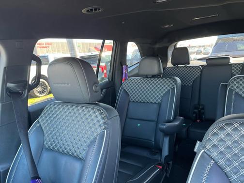 Volcanic Red Tintcoat 2025 GMC Acadia Denali