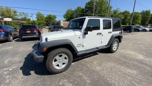 White 2015 Jeep Wrangler Unlimited Sport