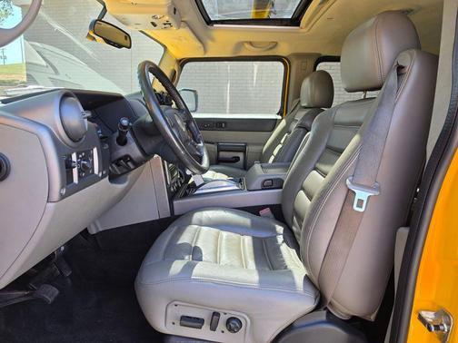 Yellow 2004 Hummer H2