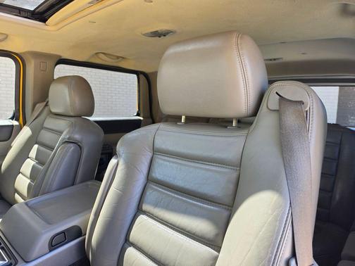 Yellow 2004 Hummer H2