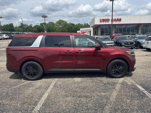 Flare Red 2023 Kia Carnival LX Seat Package