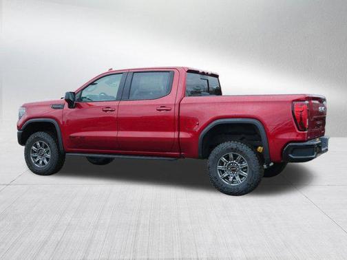 Volcanic Red Tintcoat 2026 GMC Sierra 1500 AT4X