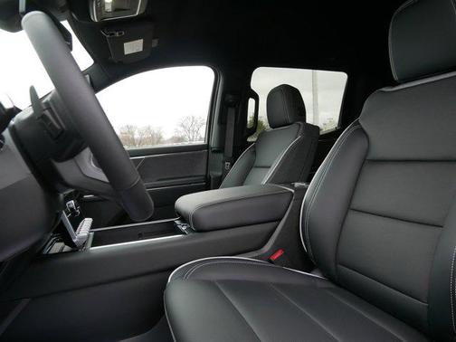 Deep Bronze Metallic 2026 GMC Sierra EV Standard Range Elevation