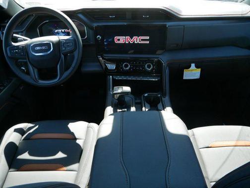 Volcanic Red Tintcoat 2026 GMC Sierra 1500 AT4