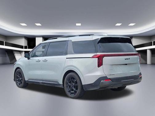 Ivory Silver 2025 Kia Carnival SX Prestige