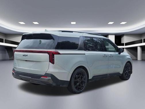 Ivory Silver 2025 Kia Carnival SX Prestige