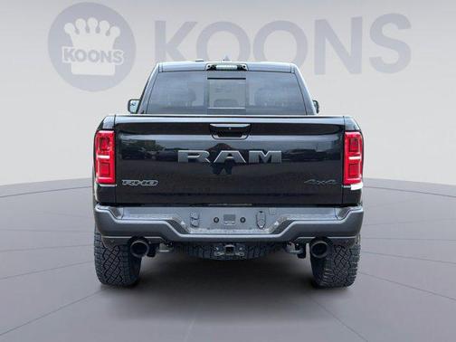 Diamond Black Crystal Pearlcoat 2026 RAM 1500 RHO Crew Cab 4x4 5'7' Box