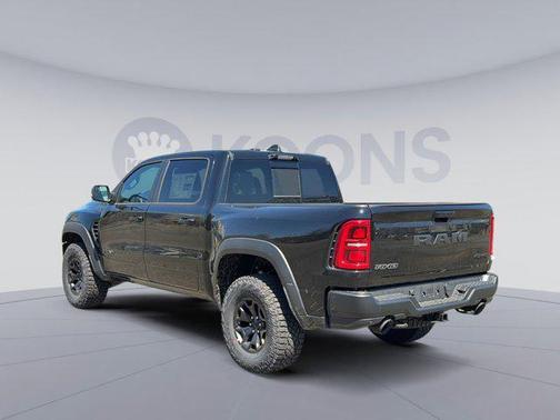 Diamond Black Crystal Pearlcoat 2026 RAM 1500 RHO Crew Cab 4x4 5'7' Box