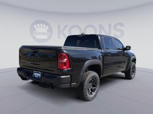 Diamond Black Crystal Pearlcoat 2026 RAM 1500 RHO Crew Cab 4x4 5'7' Box