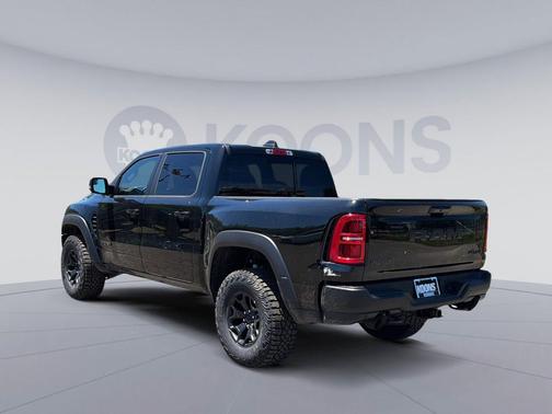 Diamond Black Crystal Pearlcoat 2026 RAM 1500 RHO Crew Cab 4x4 5'7' Box