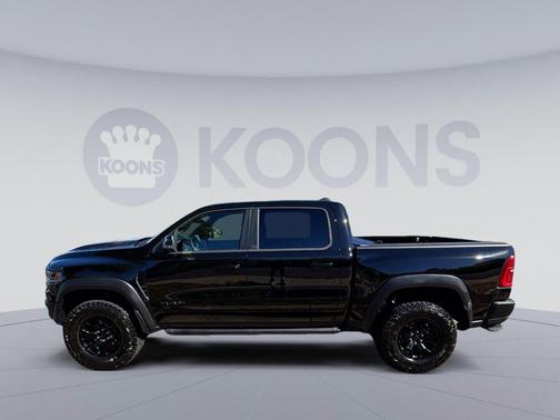 Diamond Black Crystal Pearlcoat 2026 RAM 1500 RHO Crew Cab 4x4 5'7' Box