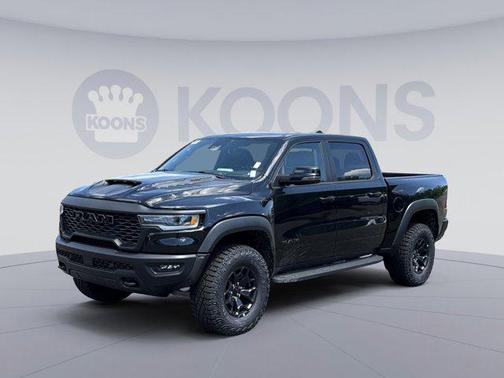 Diamond Black Crystal Pearlcoat 2026 RAM 1500 RHO Crew Cab 4x4 5'7' Box