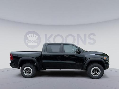 Diamond Black Crystal Pearlcoat 2026 RAM 1500 RHO Crew Cab 4x4 5'7' Box