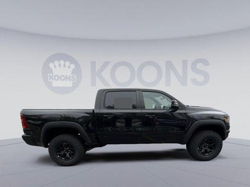 Diamond Black Crystal Pearlcoat 2026 RAM 1500 RHO Crew Cab 4x4 5'7' Box