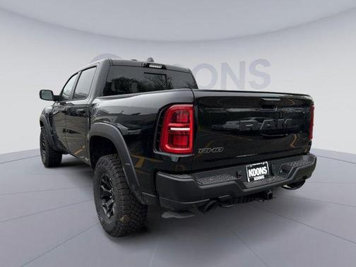 Diamond Black Crystal Pearlcoat 2026 RAM 1500 RHO Crew Cab 4x4 5'7' Box