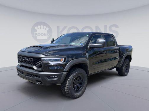 Diamond Black Crystal Pearlcoat 2026 RAM 1500 RHO Crew Cab 4x4 5'7' Box