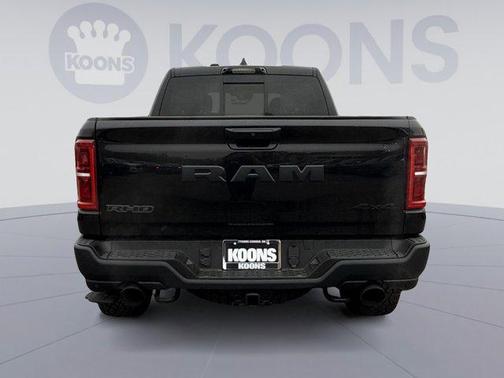 Diamond Black Crystal Pearlcoat 2026 RAM 1500 RHO Crew Cab 4x4 5'7' Box