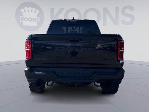 Diamond Black Crystal Pearlcoat 2026 RAM 1500 RHO Crew Cab 4x4 5'7' Box