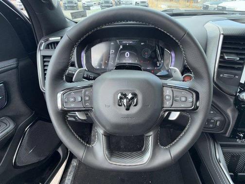 Diamond Black Crystal Pearlcoat 2026 RAM 1500 RHO Crew Cab 4x4 5'7' Box
