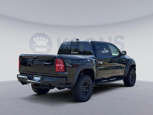 Diamond Black Crystal Pearlcoat 2026 RAM 1500 RHO Crew Cab 4x4 5'7' Box