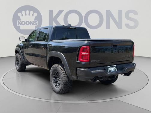 Diamond Black Crystal Pearlcoat 2026 RAM 1500 RHO Crew Cab 4x4 5'7' Box