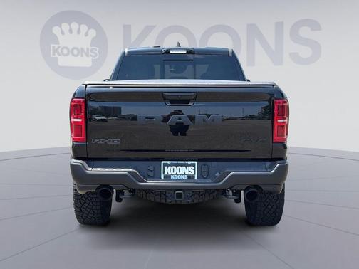 Diamond Black Crystal Pearlcoat 2026 RAM 1500 RHO Crew Cab 4x4 5'7' Box