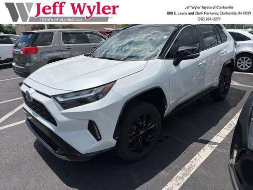 Wind Chill Pearl/Midnight Black Metallic 2023 Toyota RAV4 Hybrid SE