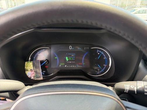 Wind Chill Pearl/Midnight Black Metallic 2023 Toyota RAV4 Hybrid SE