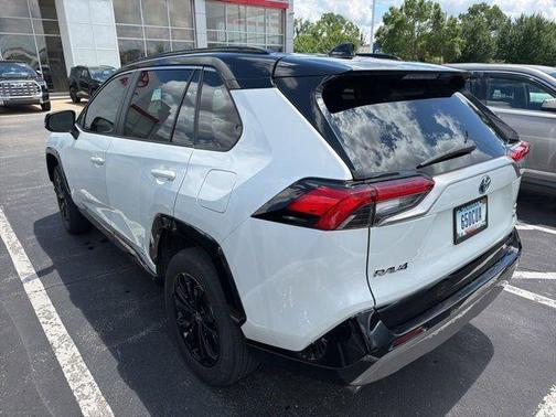 Wind Chill Pearl/Midnight Black Metallic 2023 Toyota RAV4 Hybrid SE