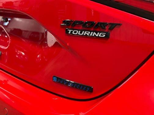 Red 2026 Honda Civic Hybrid Sport Touring