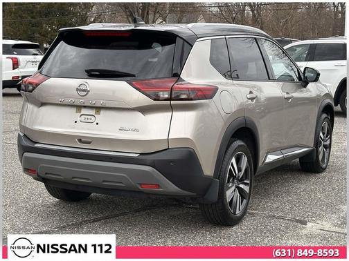 Champagne Silver Metallic/Super Black 2021 Nissan Rogue SL