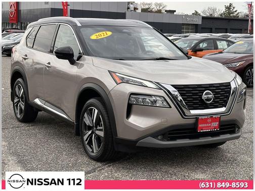 Champagne Silver Metallic/Super Black 2021 Nissan Rogue SL