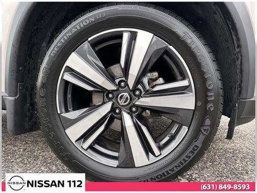 Champagne Silver Metallic/Super Black 2021 Nissan Rogue SL