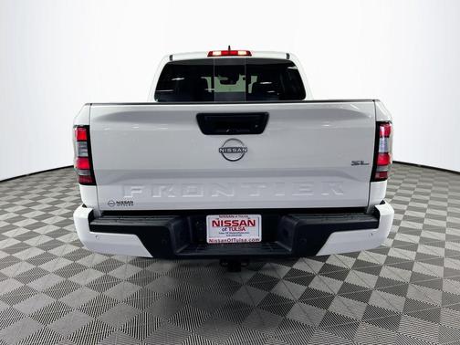 Glacier White 2024 Nissan Frontier SL