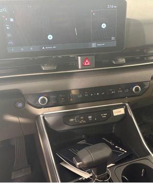 Ivory Silver 2026 Kia Carnival EX