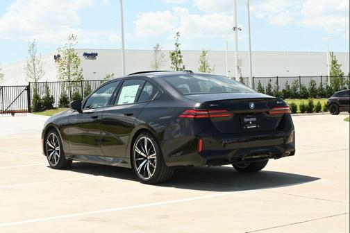Black Sapphire Metallic 2027 BMW 540 i xDrive