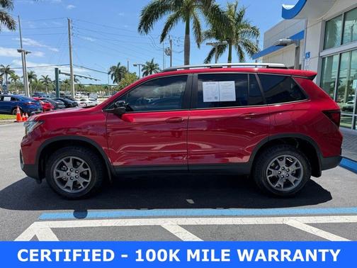 Red 2024 Honda Passport TrailSport
