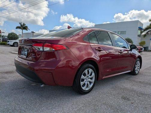 Ruby Flare Pearl 2026 Toyota Corolla Hybrid LE