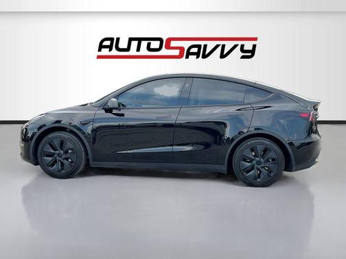 Solid Black 2025 Tesla Model Y Long Range Dual Motor Rear-Wheel Drive