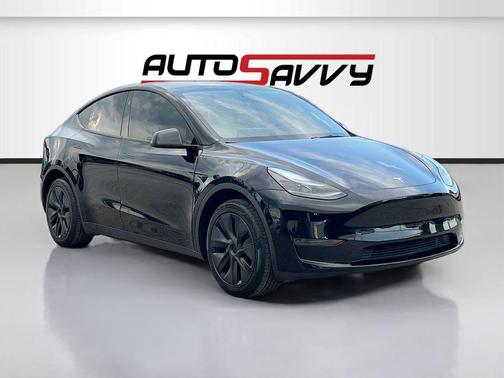 Solid Black 2025 Tesla Model Y Long Range Dual Motor Rear-Wheel Drive