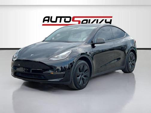 Solid Black 2025 Tesla Model Y Long Range Dual Motor Rear-Wheel Drive