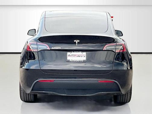 Solid Black 2025 Tesla Model Y Long Range Dual Motor Rear-Wheel Drive