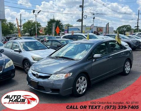 Urban Titanium Metallic 2011 Honda Civic LX