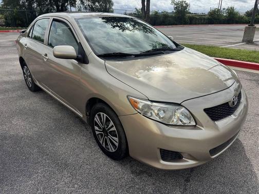 Desert Sand Mica 2010 Toyota Corolla LE